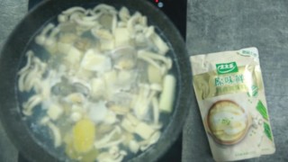  花蛤菌菇豆腐汤 第6步